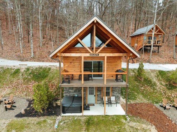 A picturesque luxury lodge rental nestled in the woods near Tappan Lake.